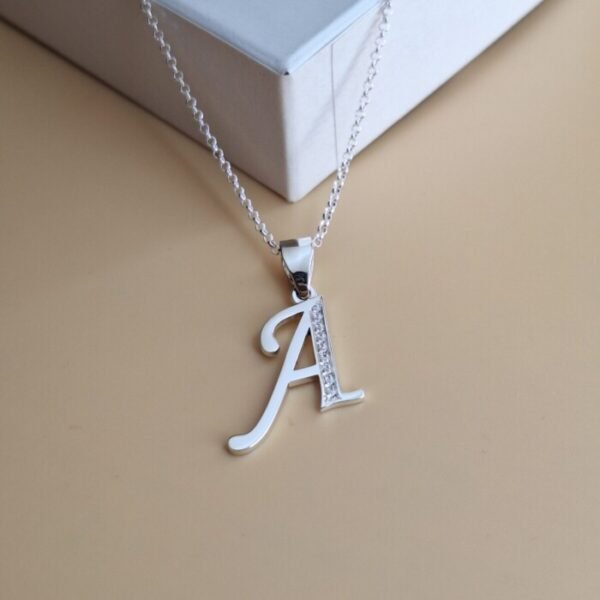 COLLAR LETRA CON CIRCONES 189 COLLAR LETRA CON CIRCONES
